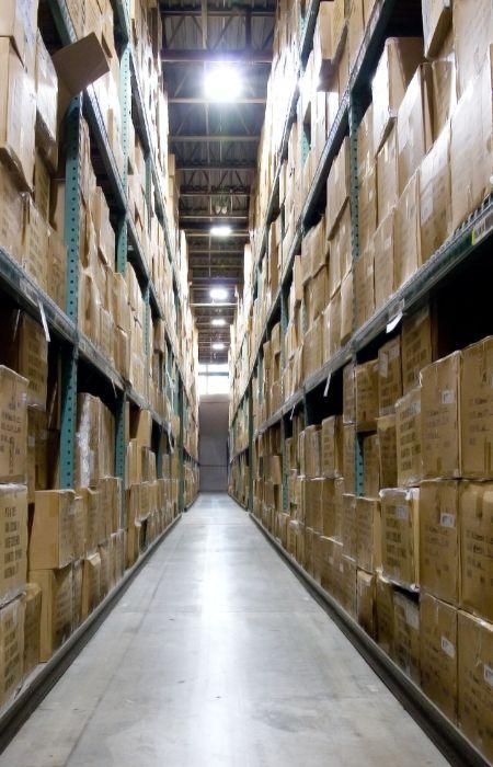 Warehouse lit by modern LED linear fixtures after retrofit.