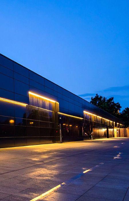 Commercial façade illuminated by LED wall packs.